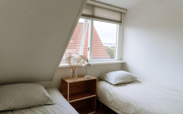 Nice Holiday Home on the Water in Grou