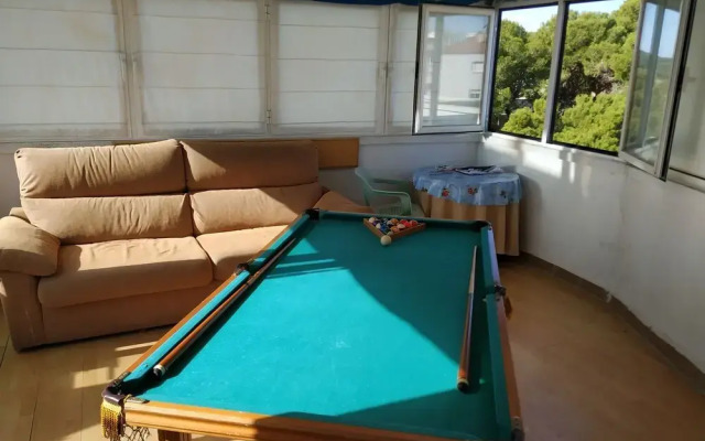 Apartamento con chillout, BBQ y playa a 2 min.