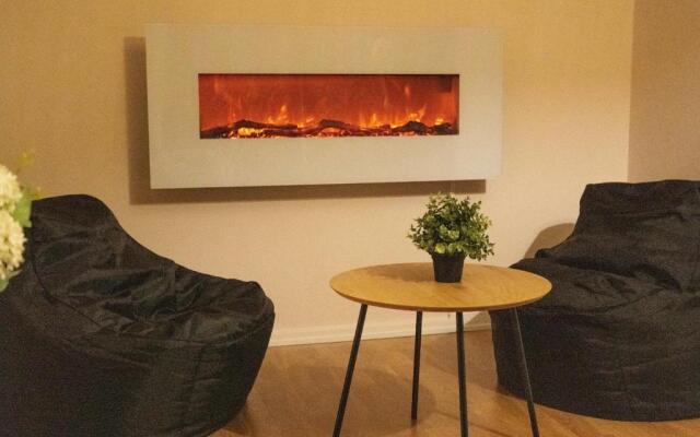 Design apartment with lake view, sauna, fireplace