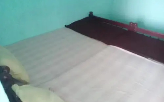 SPOT ON 68298 Prarthana Tourist Home