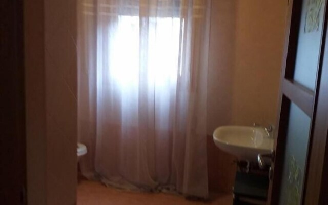 Room in Guest Room - Camera Rosa Appartamento Quadrifoglio