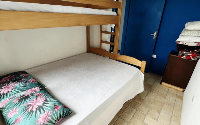 PÉ NA AREIA apartamento térreo