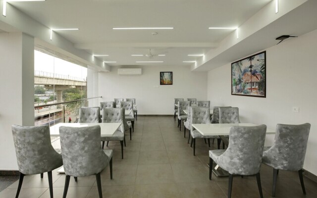 Capital O 22459 Edasserys Kalamassery Tourist Home