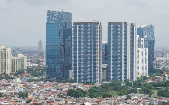 Strategic Location 1BR The Wave Apartment with City View