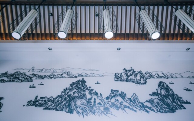 Xinhualian Lv Xin Gu Hotel