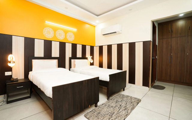Fabhotel Tanvi Premium