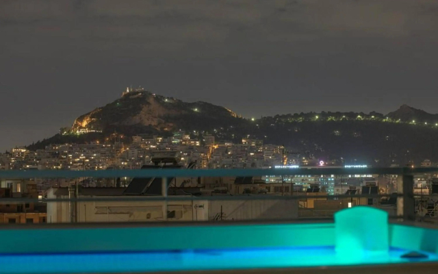 Pristine penthouse with Parthenon view by the pool