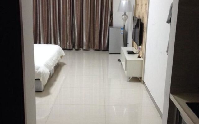 Xing Yi International Hotel Apartment