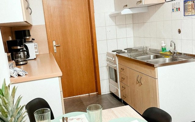 Suiteable Living - Boardinghaus mit Parkplätzen, WLAN und Waschraum