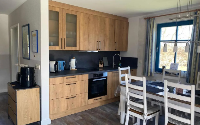 Reetdachhaus Eibe 2, Kaminofen, Sauna, 8 Personen, W-Lan