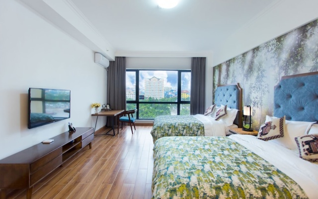 YUMI Apartment-Boshui Sq Branch – Guest Rooms – Xishuangbanna