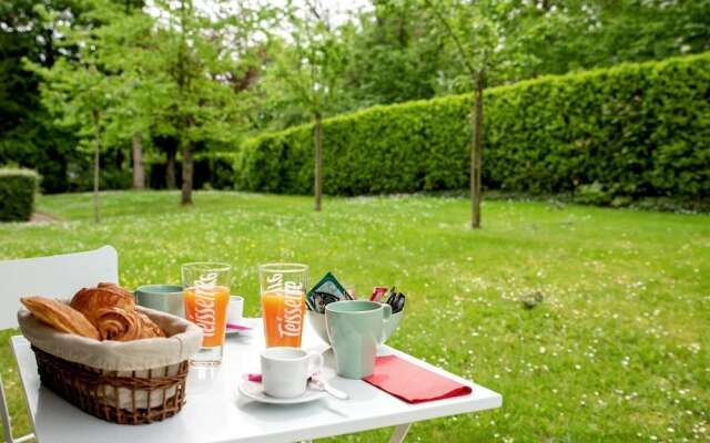 Chic Appartement avec Terrasse, Parking Privatif