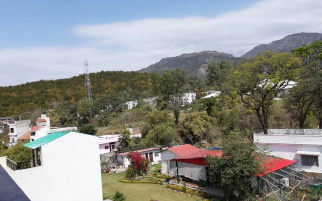 Goroomgo Hotel Ambika House Dehradun