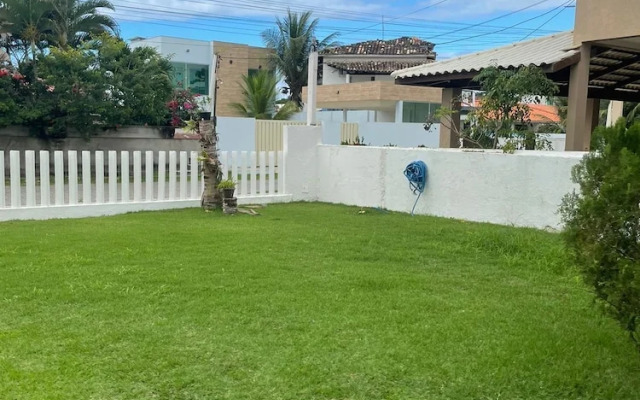 Quarto na praia com cama de casal