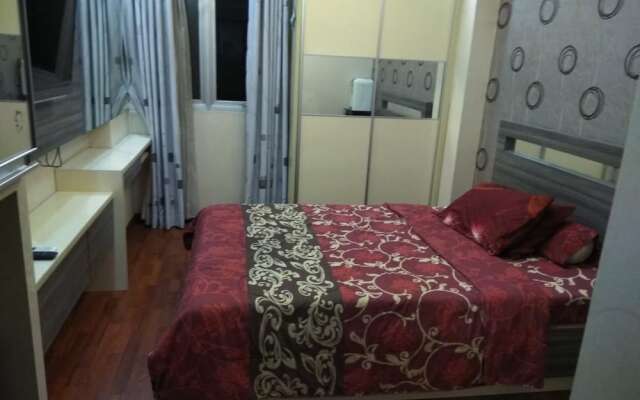 Apartment The Suites Metro by Herlan