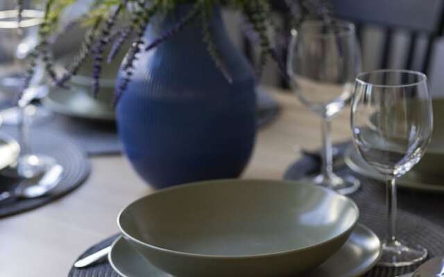 Grey Apartment Śródmieście by Renters