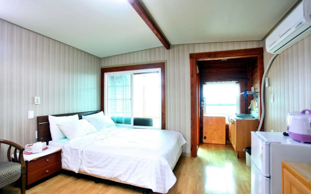 Windmill and Sea Pension
