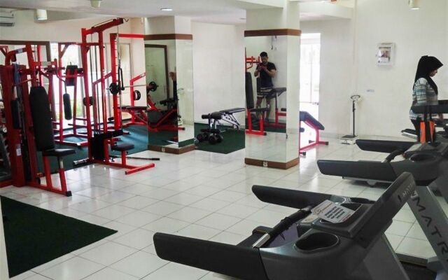 Monochrome Style 2 Bedrooms at Kalibata City Apartment By Travelio