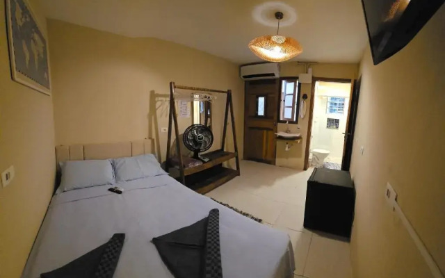 Quarto 100m da praia Pereque