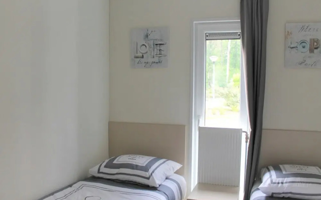 Modern chalet with a dishwasher, near a pond