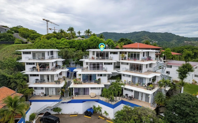 Modern Top-Floor Condo with Panoramic Views and Community Pool