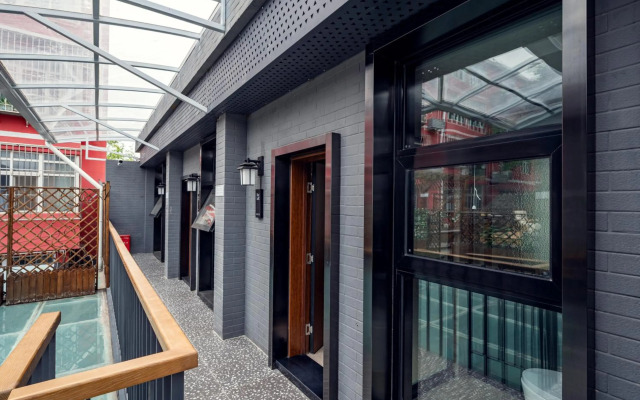 Qiuguo Hutong Courtyard Hotel