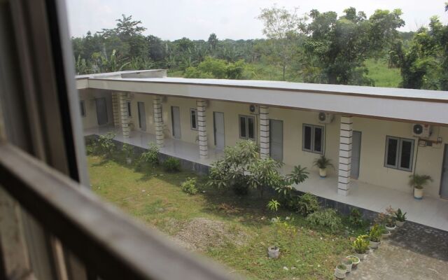 Penginapan Transit Tomato