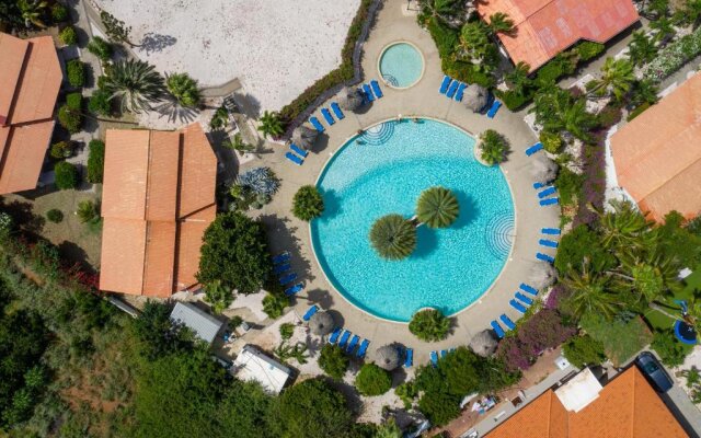 Studio at the pool in tropical Resort Seru Coral with privacy and large pool