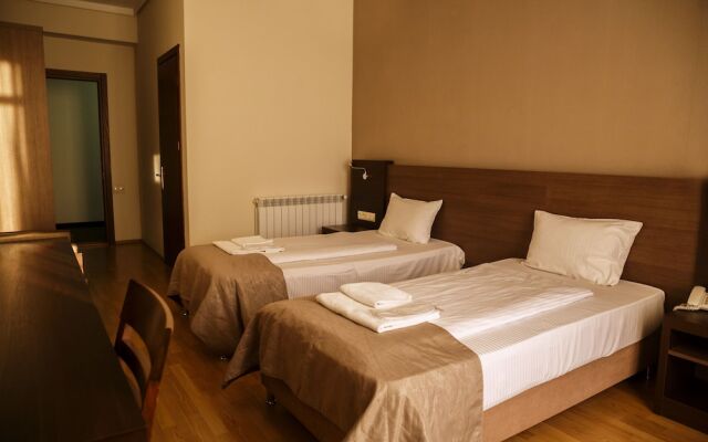 Olympus Hotel By Umbrella