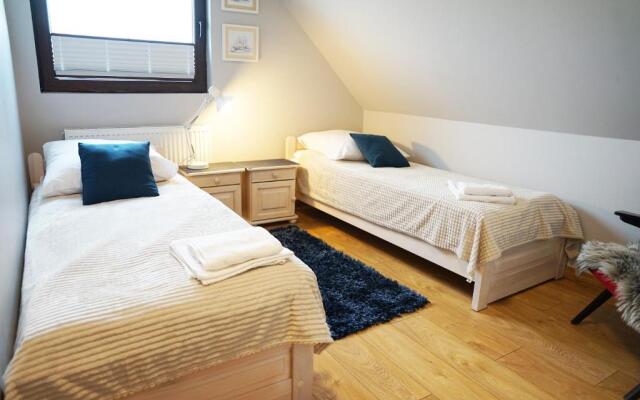 Holiday Resort With Sauna and Jacuzzi, Mielenko