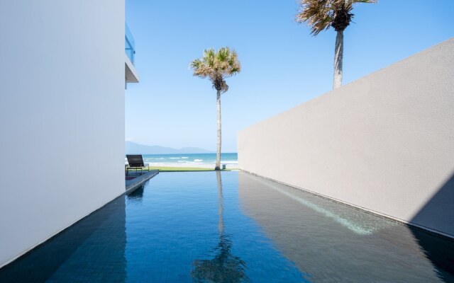 Beach front villa by Emblemsea in hyatt