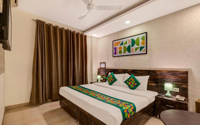 Treebo Riddhi Paradise - 15 mins from Airport