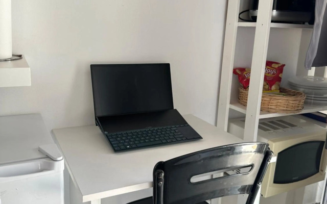 Mediterranean poolside garden cottage