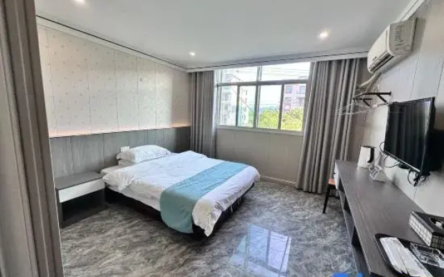 Wanzai Huadu Business Hotel