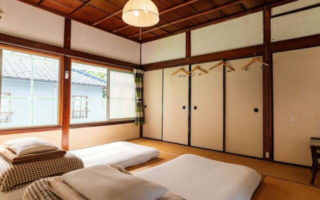 Guesthouse Momonga Village - Hostel