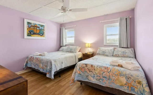 Oceanfront Beach Condo with Private Balcony, Short Walk to Pool and Beach by RedAwning