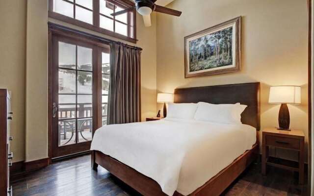 Expansive 4 Bedroom Ski in, Ski out One Ski Hill Residence Located at the Base of Peak 8 with Beautiful Views