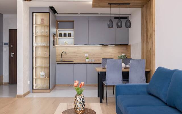 Dark Blue Apartment in Kraków by Renters