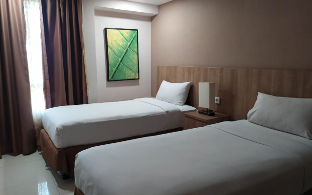 Grand Tropic Suites Hotel