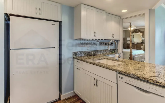 Newly Remodeled Oceanfront Condo with Salt Water Pool and Private Walkway to Beach by RedAwning