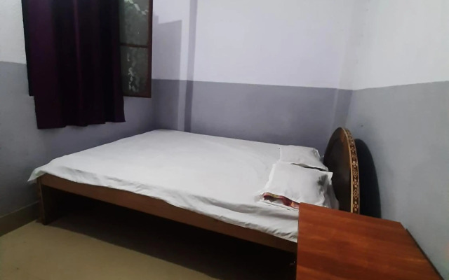 SPOT ON 87876 Gajadhar Rest House