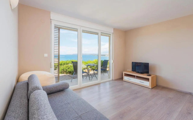 Two-Bedroom Apartment in Povljana