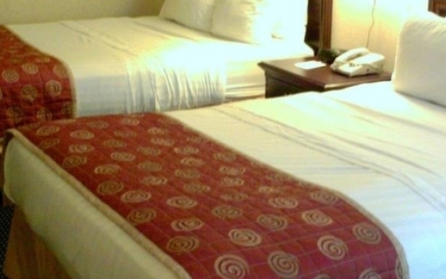 Merit Hotel & Suites