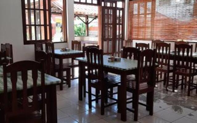 Pousada Flor do Dende