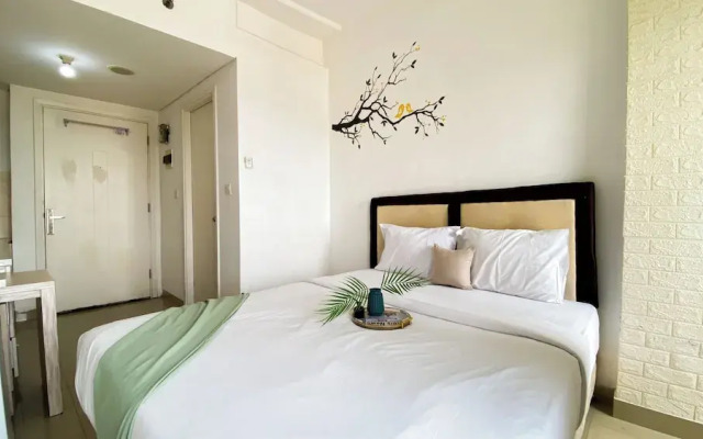 Homey And Cozy Living Studio At Poris 88 Apartment