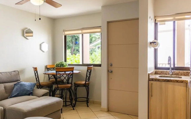 Cozy Condo with Panoramic Hillside Views from Rooftop Terrace and Short Walk to Beach