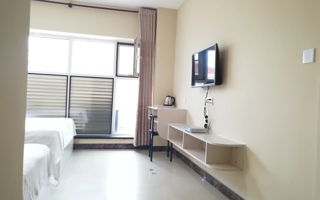 Weihai Jiaqi Hotel (Weihai high speed railway bus terminal store)