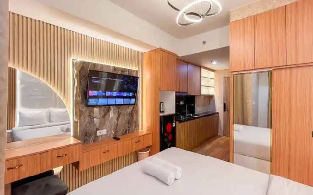 Nice and Comfortable Studio Apartment at Delft Ciputra Makassar By Travelio – Guest Rooms – Makassar