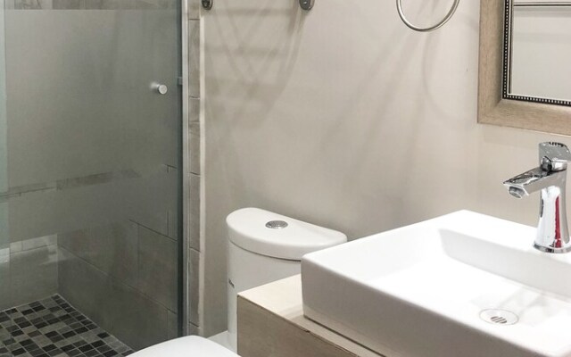 Capital O Palms Hotel