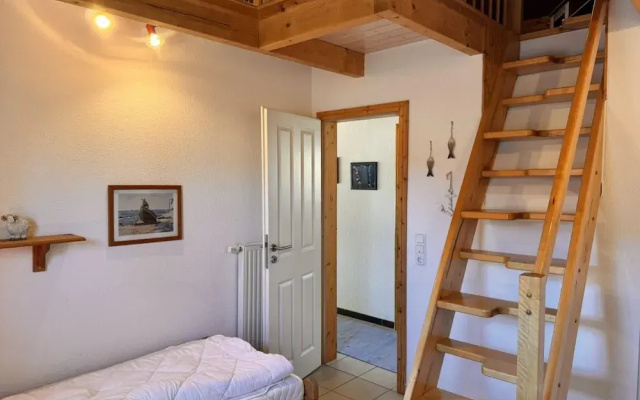 Ferienhaus mit Kaminofen in Burhave
